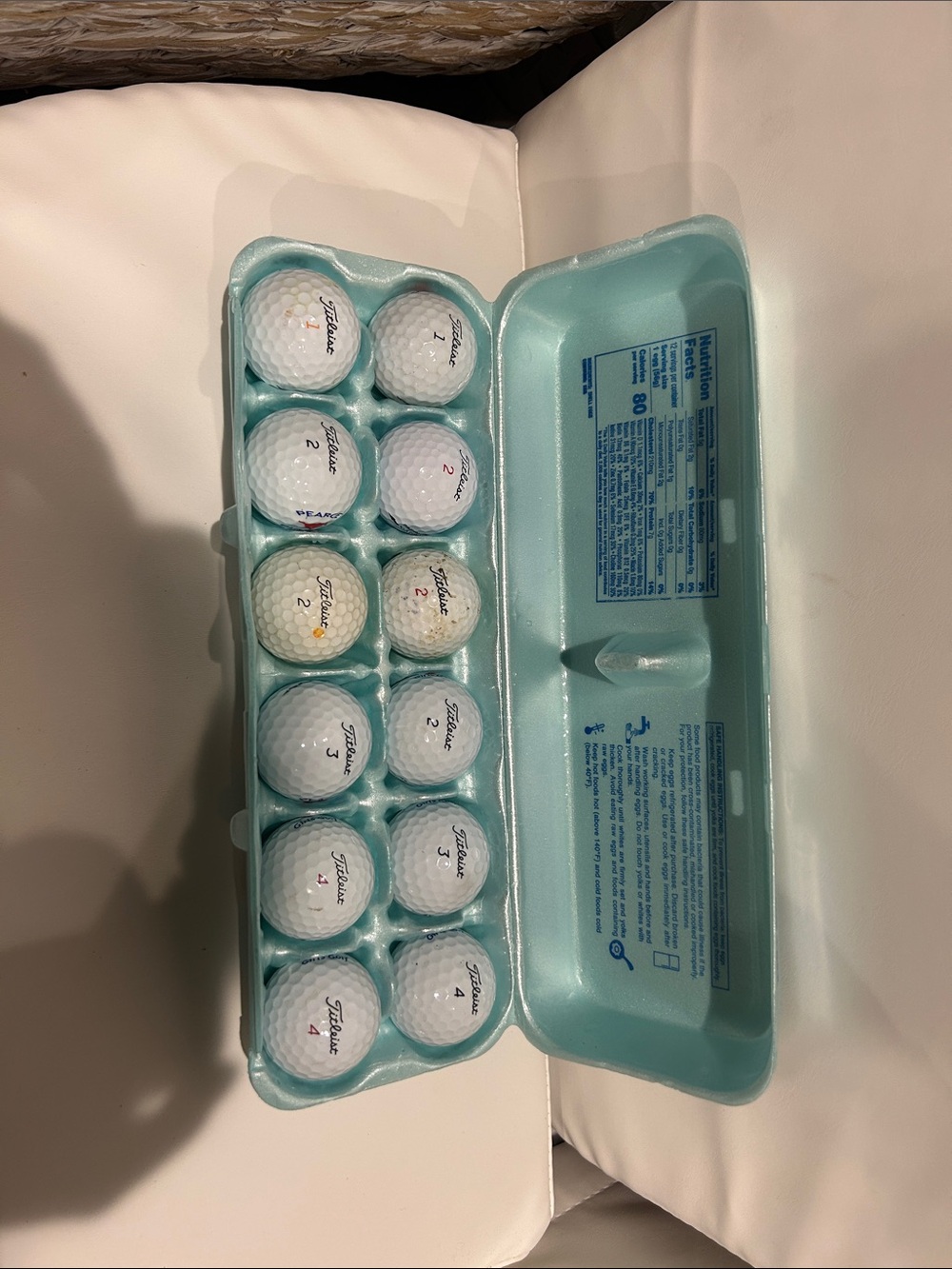Titleist White Golf Balls in Light Blue Egg-Style Case